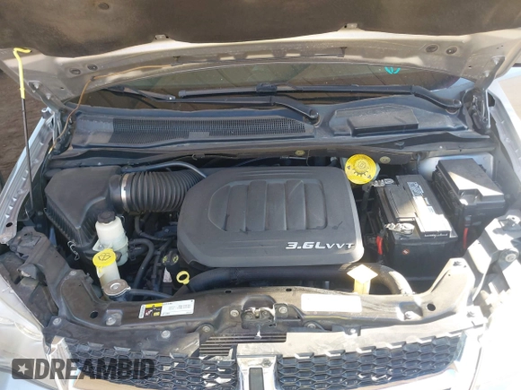 2016 Dodge Grand Caravan SXT with VIN 2C4RDGCG9GR323668, listed as a IAAI auction lot 42025601 with 125,351 mi miles and . Bid and sale history available at DreamBid. Image 10.