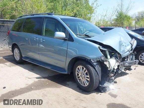2009 Toyota Sienna XLE with VIN 5TDZK22C99S239755, listed as a IAAI auction lot 42096411 with 214,983 mi miles. Bid and sale history available at carsss.com. Image 1.