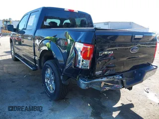 2015 Ford F-150 XLT with VIN 1FTEW1EG6FKF22211, listed as a IAAI auction lot 41753438 with 130,019 mi miles. Bid and sale history available at carsss.com. Image 3.