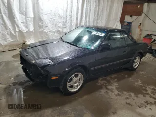 1986 Toyota MR2 z VIN JT2AW15C6G0076546, wystawiony jako Copart lot #73481234 z przebiegiem 148 909 mil mil oraz Szkody całkowita. Historia ofert i sprzedaży dostępna na DreamBid. Obrazek 1.