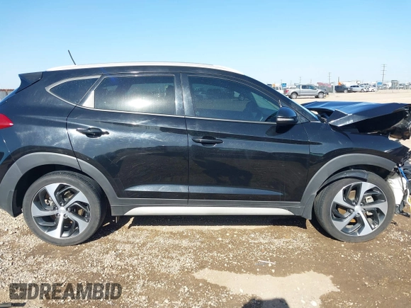 2017 Hyundai Tucson Sport z VIN KM8J33A23HU490270, wystawiony jako IAAI lot #42042967 z przebiegiem 121 660 mil mil oraz . Historia ofert i sprzedaży dostępna na DreamBid. Obrazek 13.