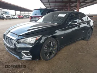 2019 Infiniti Q50 Luxe with VIN JN1EV7ARXKM593846, listed as a IAAI auction lot 42773548 with 57,165 mi miles and . Bid and sale history available at DreamBid. Image 2.