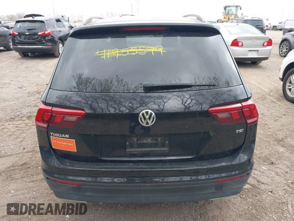 2018 Volkswagen Tiguan S with VIN 3VV1B7AX1JM076071, listed as a IAAI auction lot 42043311 with 107,883 mi miles and . Bid and sale history available at DreamBid. Image 16.