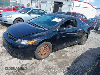 2009 Honda Civic EX with VIN 2HGFG12899H518424, listed as a IAAI auction lot 42019765 with 214,577 mi miles and . Bid and sale history available at DreamBid. Image 2.