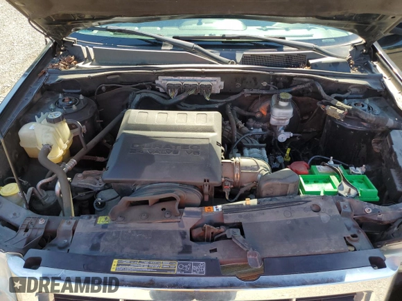 2010 Ford Escape Limited с VIN 1FMCU9EG4AKB62047, выставлен на аукционе Copart как лот 62946685 с пробегом 87 232 миль миль и Списание • Salvage title. История ставок и продаж доступна на DreamBid. Изображение 11.
