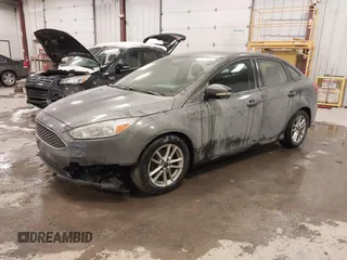 2015 Ford Focus SE with VIN 1FADP3F2XFL342480, listed as a IAAI auction lot 41607487 with 103,530 mi miles. Bid and sale history available at carsss.com. Image 2.