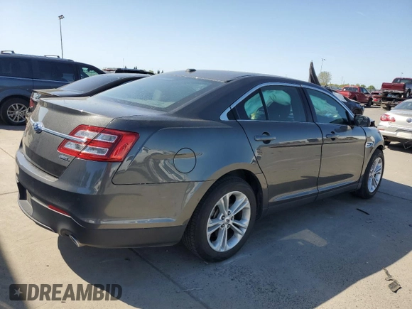 2015 Ford Taurus SEL z VIN 1FAHP2E86FG203425, wystawiony jako Copart lot #52261295 z przebiegiem 78 575 mil mil oraz Szkoda całkowita • Salvage title. Historia ofert i sprzedaży dostępna na DreamBid. Obrazek 3.