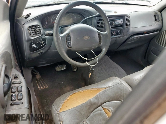 2001 Ford F-150 XLT z VIN 1FTRW08L31KF27329, wystawiony jako Copart lot #61018835 z przebiegiem Nie podano mil oraz Czysty tytuł • Clean title. Historia ofert i sprzedaży dostępna na DreamBid. Obrazek 8.