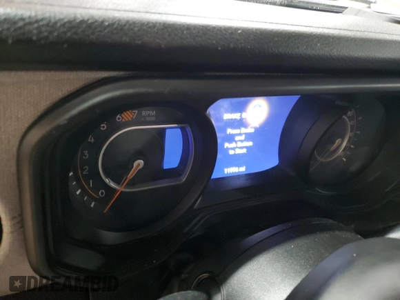 2024 Jeep Wrangler Willys with VIN 1C4PJXAG4RW260511, listed as a Copart auction lot 42425645 with 11,996 mi miles and Salvage title. Bid and sale history available at DreamBid. Image 9.