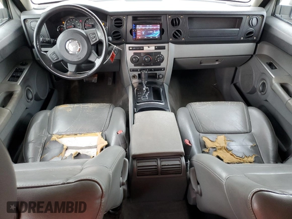 2006 Jeep Commander with VIN 1J8HH48N06C352871, listed as a Copart auction lot 87740115 with 163,703 mi miles and Salvage Title. Bid and sale history available at carsss.com. Image 8.