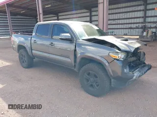 2016 Toyota Tacoma SR5 z VIN 3TMAZ5CN4GM004087, wystawiony jako IAAI lot #41194689 z przebiegiem 88 671 mil mil oraz . Historia ofert i sprzedaży dostępna na DreamBid. Obrazek 1.