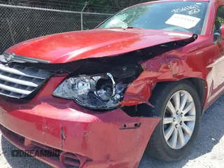 2010 Chrysler Sebring Limited with VIN 1C3CC5FB8AN133656, listed as a IAAI auction lot 42561161 with 145,785 mi miles and . Bid and sale history available at DreamBid. Image 6.