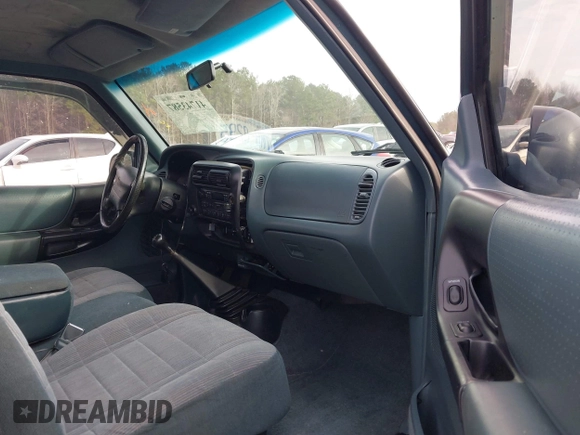 1997 Ford Ranger XLT z VIN 1FTCR10A6VUA47101, wystawiony jako IAAI lot #41743587 z przebiegiem 87 277 mil mil oraz . Historia ofert i sprzedaży dostępna na DreamBid. Obrazek 5.