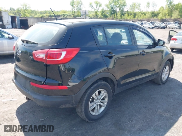 2012 Kia Sportage LX with VIN KNDPB3A28C7187185, listed as a IAAI auction lot 42233774 with 223,235 mi miles and . Bid and sale history available at DreamBid. Image 4.