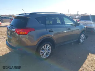 2015 Toyota RAV4 Limited with VIN 2T3YFREV9FW163244, listed as a IAAI auction lot 41599194 with 106,902 mi miles. Bid and sale history available at carsss.com. Image 4.