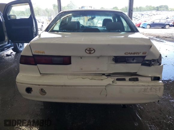 1999 Toyota Camry LE с VIN JT2BG22K3X0317823, выставлен на аукционе Copart как лот 58203965 с пробегом 167 587 миль миль и Списание • Salvage title. История ставок и продаж доступна на DreamBid. Изображение 6.