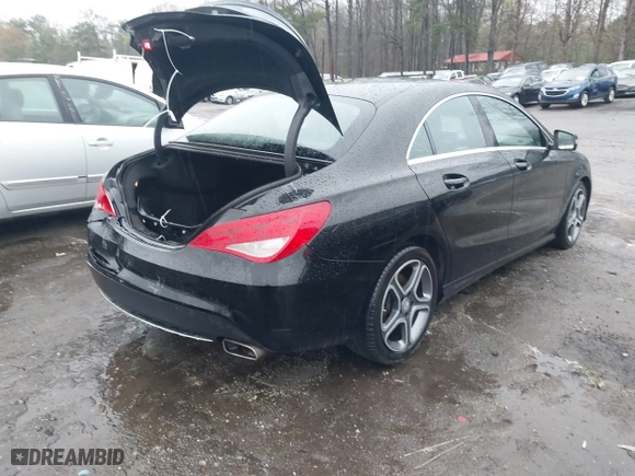 2014 Mercedes-Benz CLA-Class CLA 250 with VIN WDDSJ4EBXEN039623, listed as a IAAI auction lot 41840087 with 127,449 mi miles. Bid and sale history available at carsss.com. Image 4.
