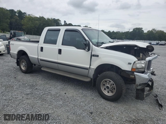 2000 Ford Super Duty F-250 XL with VIN 1FTNW21S1YED90136, listed as a Copart auction lot 71520914 with 378,931 mi miles and Salvage Title. Bid and sale history available at carsss.com. Image 4.