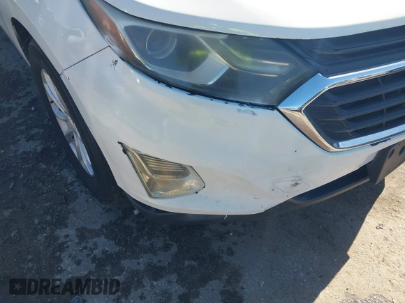 2018 Chevrolet Equinox LS with VIN 2GNAXHEV7J6293821, listed as a IAAI auction lot 41475150 with 80,785 mi miles and . Bid and sale history available at DreamBid. Image 17.