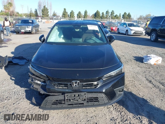2022 Honda Civic LX z VIN 2HGFE2F29NH580563, wystawiony jako IAAI lot #41861920 z przebiegiem 15 559 mil mil oraz . Historia ofert i sprzedaży dostępna na DreamBid. Obrazek 13.