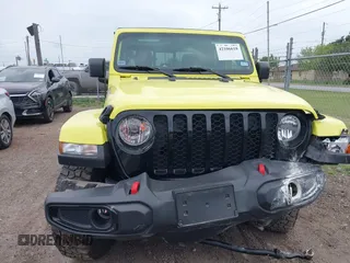 2023 Jeep Gladiator Sport S with VIN 1C6HJTAG1PL576760, listed as a IAAI auction lot 42106618 with 24,738 mi miles and . Bid and sale history available at DreamBid. Image 12.