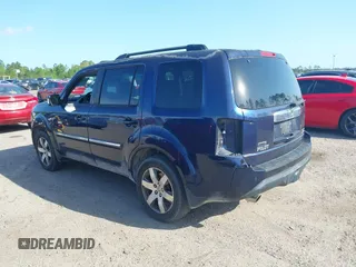 2014 Honda Pilot Touring with VIN 5FNYF4H92EB019248, listed as a IAAI auction lot 41942963 with 136,183 mi miles and . Bid and sale history available at carsss.com. Image 3.
