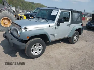2011 Jeep Wrangler Sport with VIN 1J4AA2D18BL546069, listed as a IAAI auction lot 42139693 with 56,395 mi miles and . Bid and sale history available at carsss.com. Image 2.
