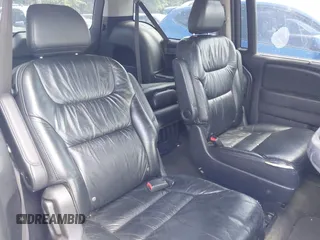 2010 Honda Odyssey Touring with VIN 5FNRL3H90AB053710, listed as a IAAI auction lot 42577646 with 255,351 mi miles and . Bid and sale history available at DreamBid. Image 8.