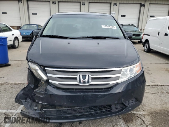 2013 Honda Odyssey EX-L with VIN 5FNRL5H61DB019930, listed as a Copart auction lot 54666775 with 175,300 mi miles and Salvage title. Bid and sale history available at DreamBid. Image 5.