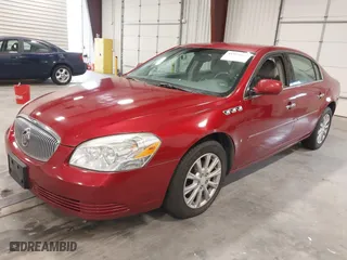 2009 Buick Lucerne CX with VIN 1G4HP57M59U103176, listed as a IAAI auction lot 41914931 with 164,743 mi miles. Bid and sale history available at carsss.com. Image 2.