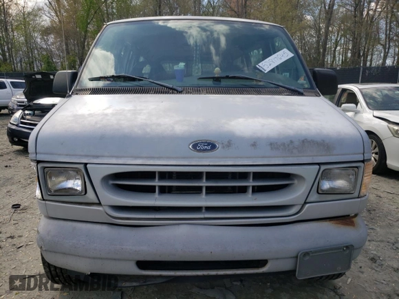 1999 Ford Econoline Passenger XL with VIN 1FBSS31LXXHA39417, listed as a Copart auction lot 52817645 with 109,930 mi miles and Salvage title. Bid and sale history available at DreamBid. Image 5.