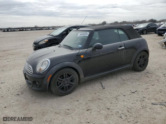 2011 MINI Cooper Convertible with VIN WMWZN3C57BT133497, listed as a Copart auction lot 46000325 with 114,917 mi miles and Clean Title. Bid and sale history available at carsss.com. Image 1.