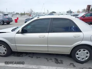 2002 Mazda Protege DX with VIN JM1BJ225121620394, listed as a IAAI auction lot 42043056 with 187,360 mi miles and . Bid and sale history available at DreamBid. Image 15.