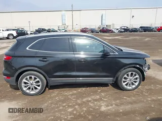 2015 Lincoln MKC with VIN 5LMTJ2AH0FUJ04461, listed as a IAAI auction lot 41804169 with 97,187 mi miles. Bid and sale history available at carsss.com. Image 13.