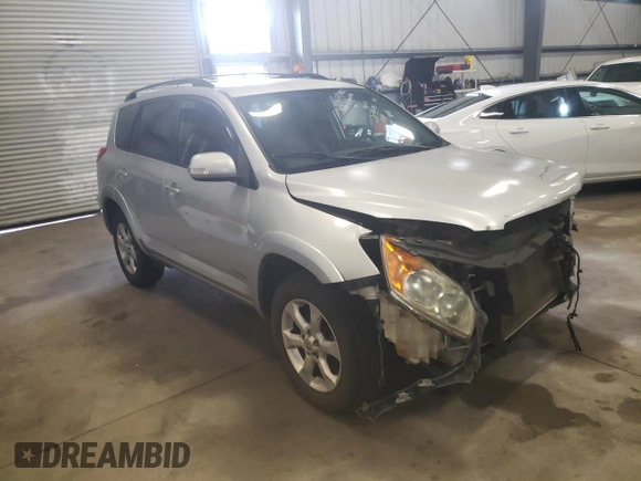 2012 Toyota RAV4 with VIN JTMXF4DV0C5043917, listed as a Copart auction lot 49664405 with 214,259 mi miles and Salvage title. Bid and sale history available at DreamBid. Image 4.