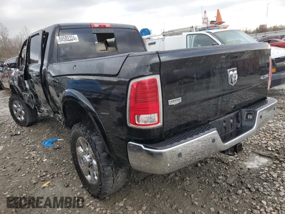 2014 Ram 2500 Laramie with VIN 3C6UR5NL0EG320324, listed as a Copart auction lot 84502324 with 180,712 mi miles and Salvage title. Bid and sale history available at DreamBid. Image 2.