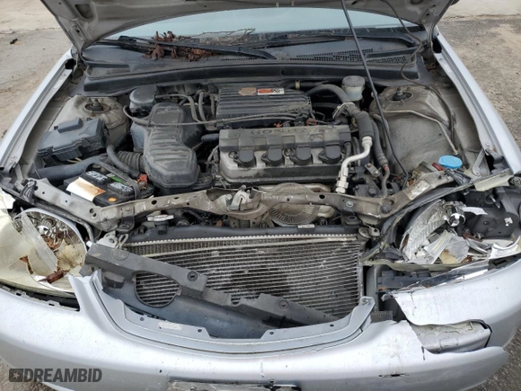 2003 Honda Civic LX with VIN 1HGES16603L014549, listed as a Copart auction lot 43153015 with 265,204 mi miles and Salvage Title. Bid and sale history available at carsss.com. Image 11.