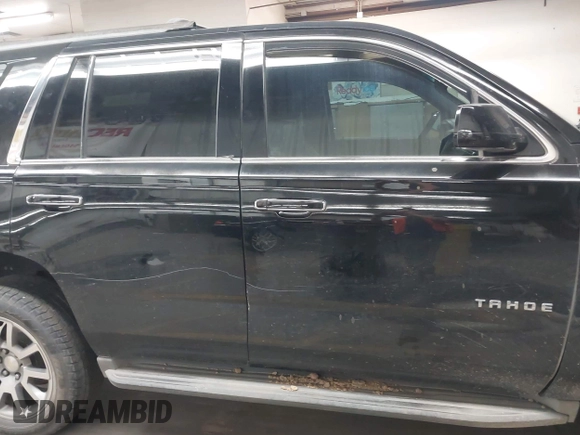 2015 Chevrolet Tahoe LT z VIN 1GNSCBKC1FR228488, wystawiony jako IAAI lot #41933869 z przebiegiem 164 523 mil mil oraz . Historia ofert i sprzedaży dostępna na DreamBid. Obrazek 14.