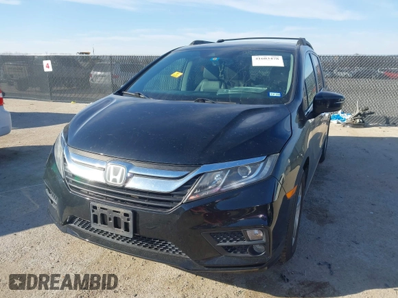 2018 Honda Odyssey EX-L z VIN 5FNRL6H74JB031306, wystawiony jako IAAI lot #41603478 z przebiegiem Nie podano mil oraz . Historia ofert i sprzedaży dostępna na DreamBid. Obrazek 17.