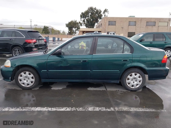 1999 Honda Civic VP with VIN 2HGEJ6618XH579736, listed as a IAAI auction lot 41912296 with 268,631 mi miles. Bid and sale history available at carsss.com. Image 15.