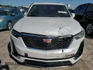 2024 Cadillac XT6 FWD Premium Luxury with VIN 1GYKPCRS1RZ700963, listed as a Copart auction lot 49031094 with 2,977 mi miles and Salvage Title. Bid and sale history available at carsss.com. Image 5.