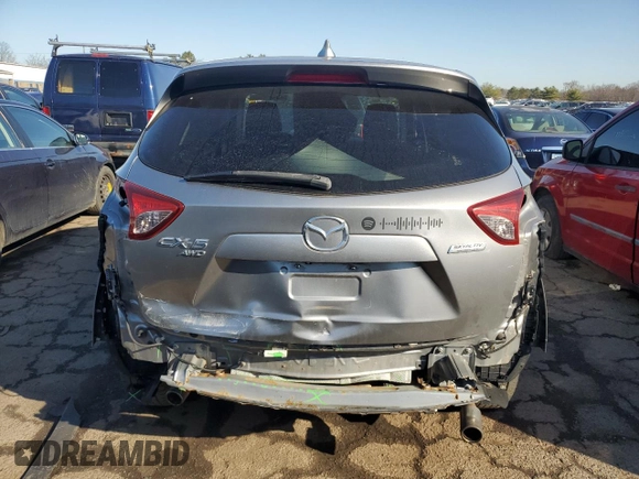 2015 Mazda CX-5 Touring with VIN JM3KE4CY5F0506569, listed as a Copart auction lot 49441035 with 160,077 mi miles and Salvage Title. Bid and sale history available at DreamBid. Image 6.