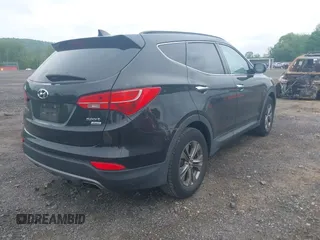 2014 Hyundai Santa Fe z VIN 5XYZUDLB9EG224174, wystawiony jako IAAI lot #42244140 z przebiegiem 84 341 mil mil oraz . Historia ofert i sprzedaży dostępna na DreamBid. Obrazek 4.
