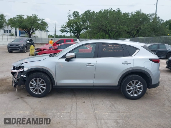 2023 Mazda CX-5 S Carbon Edition z VIN JM3KFBCM3P0197796, wystawiony jako IAAI lot #42408301 z przebiegiem 46 169 mil mil oraz . Historia ofert i sprzedaży dostępna na DreamBid. Obrazek 14.
