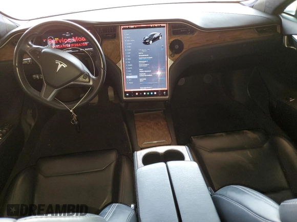 2018 Tesla Model S 75D with VIN 5YJSA1E27JF264759, listed as a Copart auction lot 59610855 with 104,375 mi miles and Salvage title. Bid and sale history available at DreamBid. Image 8.