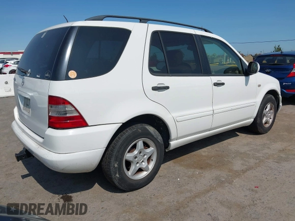 2001 Mercedes-Benz M 320/430/500 with VIN 4JGAB54E11A277233, listed as a IAAI auction lot 42519040 with 307,219 mi miles and . Bid and sale history available at DreamBid. Image 4.