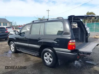 1998 Toyota Land Cruiser with VIN JT3HT05J2W0017214, listed as a IAAI auction lot 41716028 with 214,047 mi miles. Bid and sale history available at carsss.com. Image 3.