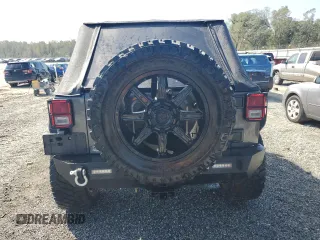 2018 Jeep Wrangler JK Unlimited Sport S with VIN 1C4BJWDG0JL842059, listed as a Copart auction lot 74382094 with 63,373 mi miles and Salvage Title. Bid and sale history available at carsss.com. Image 6.