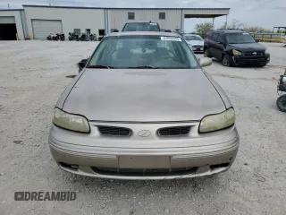 1999 Oldsmobile Cutlass GL z VIN 1G3NB52J8X6307474, wystawiony jako Copart lot #53060305 z przebiegiem 108 722 mil mil oraz Szkoda całkowita • Salvage title. Historia ofert i sprzedaży dostępna na DreamBid. Obrazek 5.