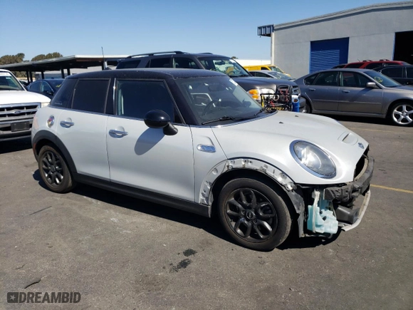 2016 MINI Cooper Hardtop 4 Door S with VIN WMWXU3C55G2D30551, listed as a Copart auction lot 72732444 with 102,316 mi miles and Salvage Title. Bid and sale history available at carsss.com. Image 4.